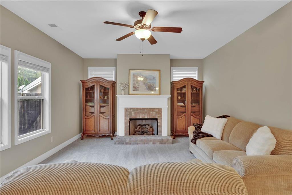 960 Verlander Trail Mableton, GA 30126 - Photo 10 of 30 a living room with furniture and a fireplace