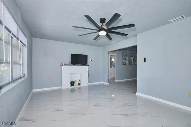 a view of a livingroom with a flat screen tv