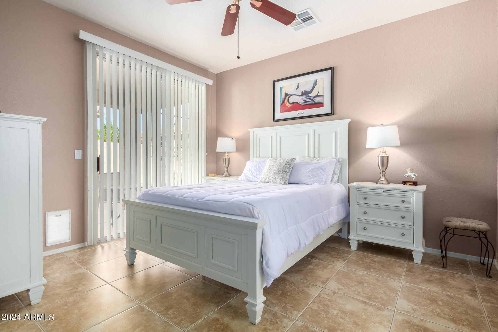 2063 South Edgewater Mesa, AZ 85209 - Photo 16 of 35 a bedroom with a bed and a chandelier fan