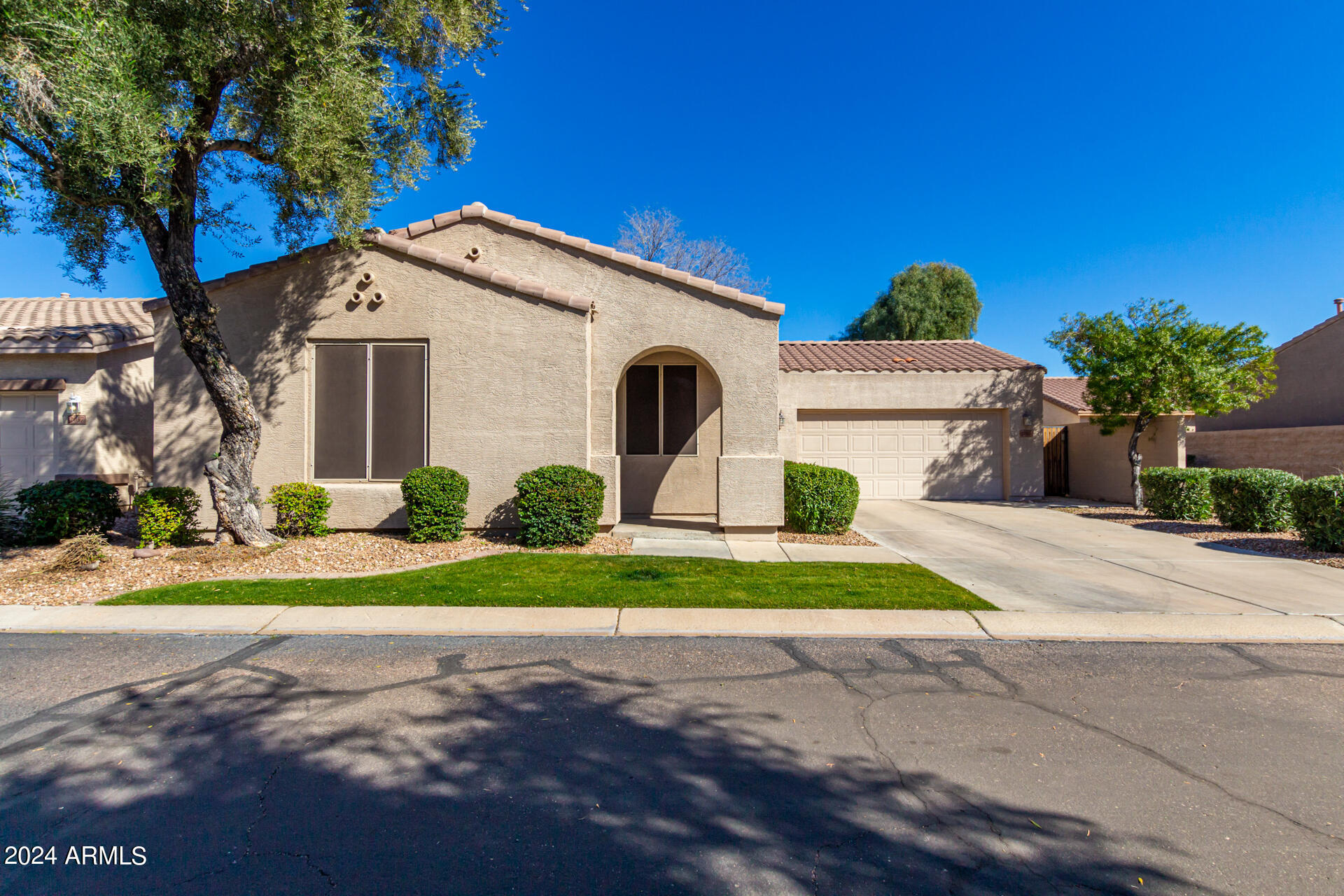 2063 South Edgewater Mesa, AZ 85209 - Photo 2 of 35 a front view of a house with garden