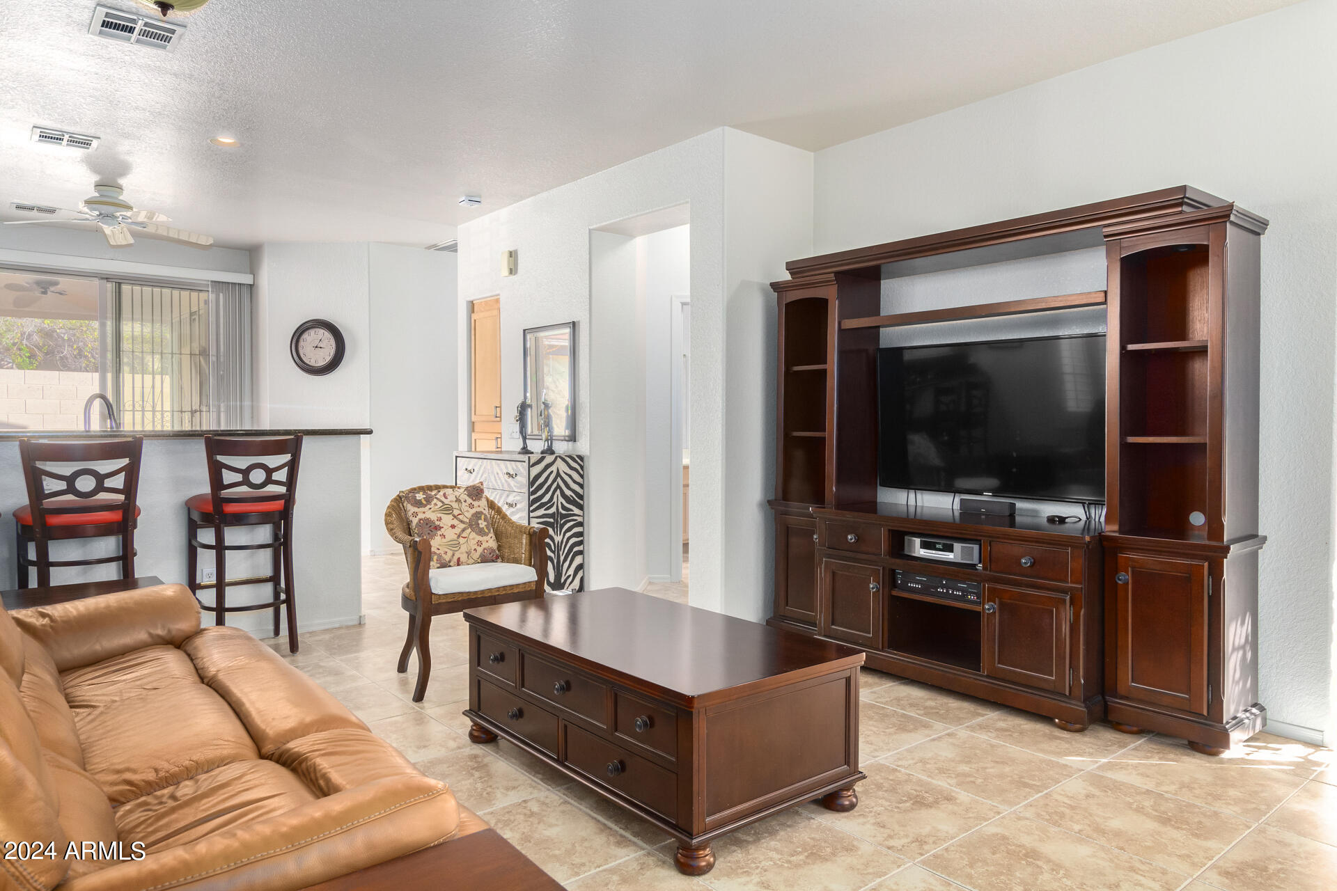 2063 South Edgewater Mesa, AZ 85209 - Photo 7 of 35 a living room with furniture and a flat screen tv