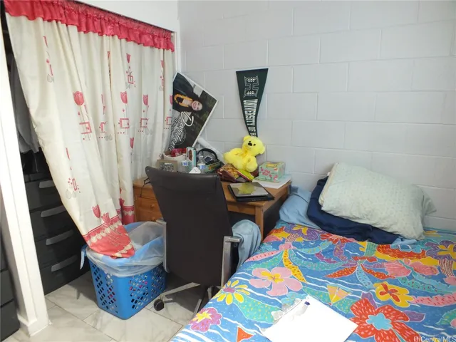 a room with furniture and a mirror