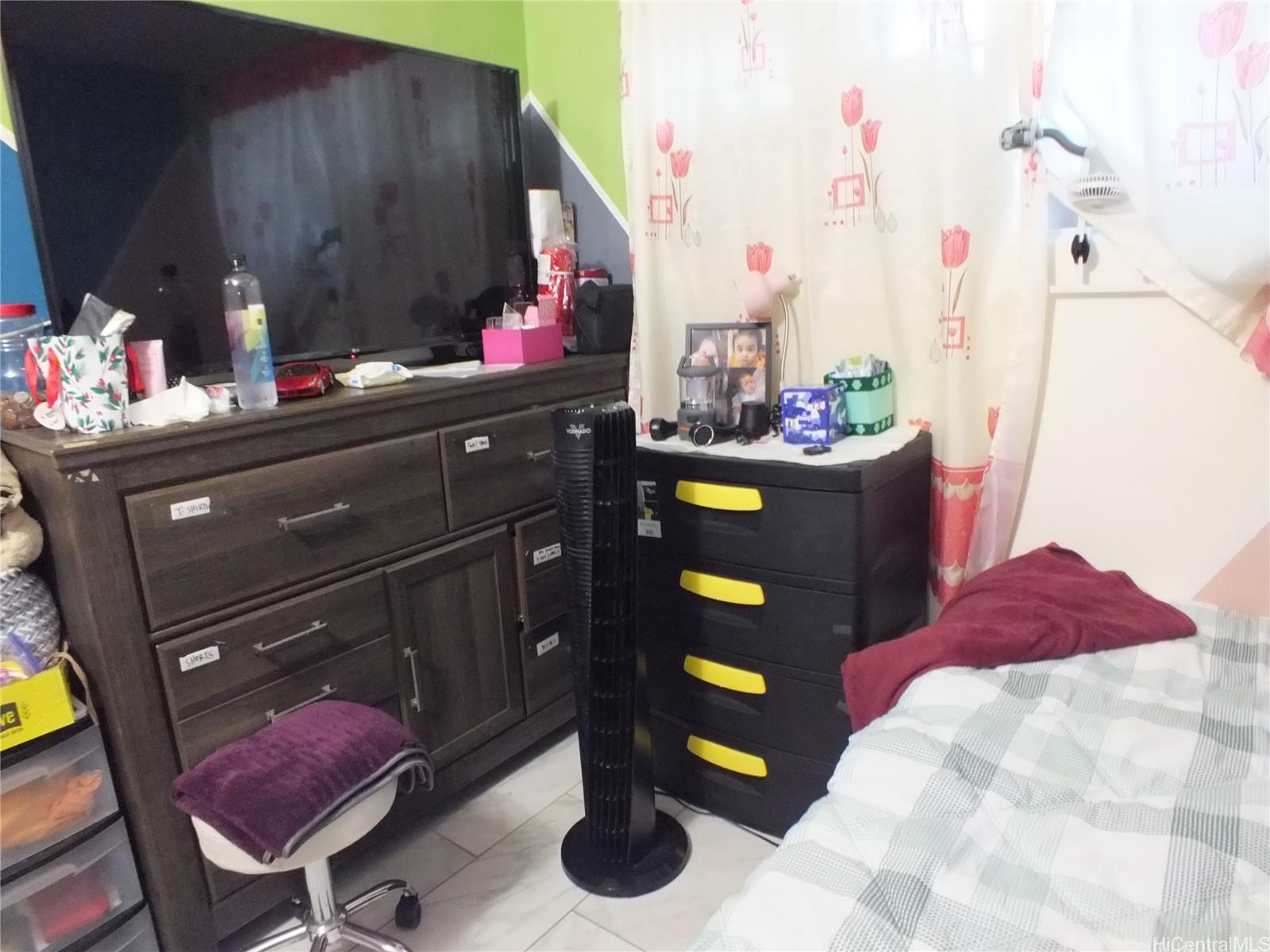 828 Puuhale Road, Unit 209 Honolulu, HI 96819 - Photo 17 of 22 a bathroom with a sink and a mirror