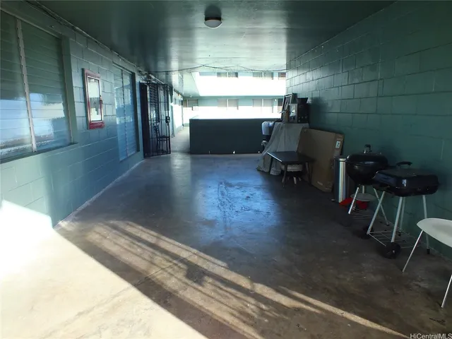 a houses and car parked in front of a house
