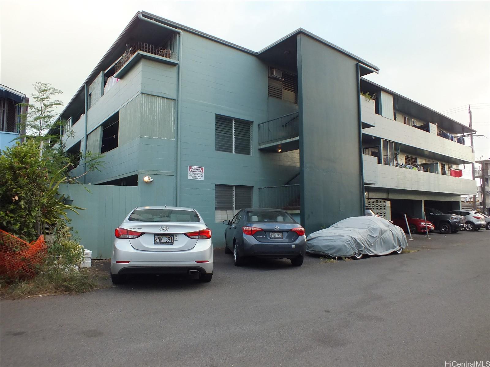 828 Puuhale Road, Unit 209 Honolulu, HI 96819 - Photo 21 of 22 a houses and car parked in front of a house