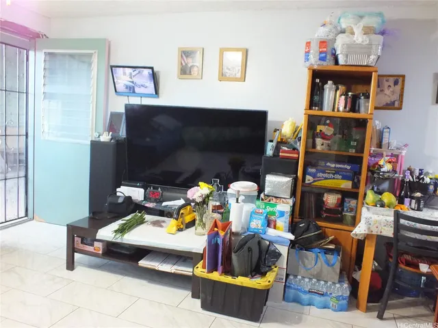 a children room with furniture and toys