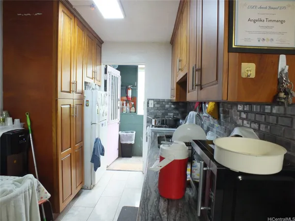 a bathroom with a sink a mirror and a bath tub