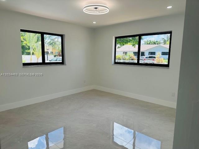 11870 Southwest 5th Street, Unit 1 Miami, FL 33184 - Photo 36 of 38 an empty room with window
