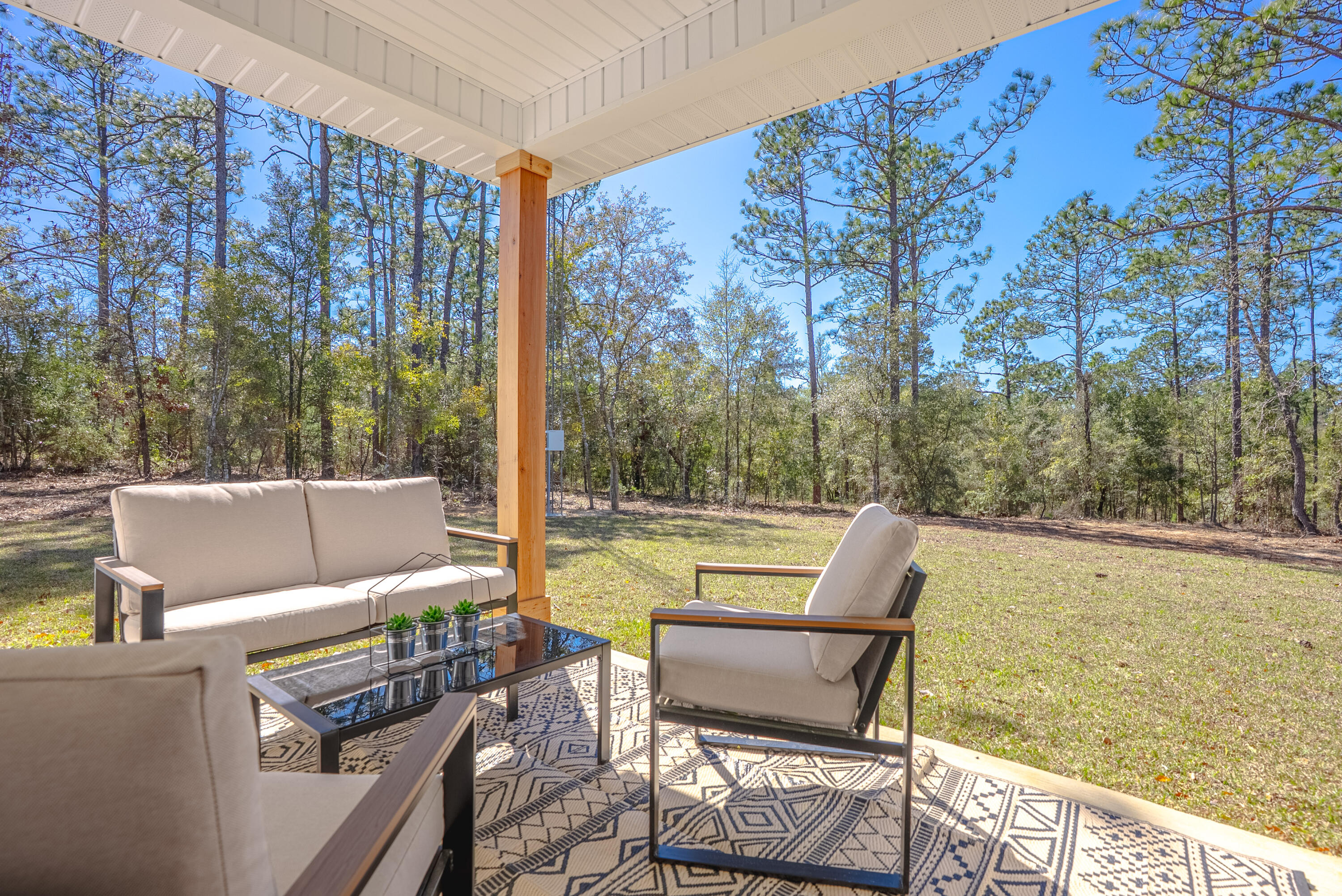 2021 Baldwin Street Chipley, FL 32428 - Photo 14 of 35 a view of a chairs and table in the balcony