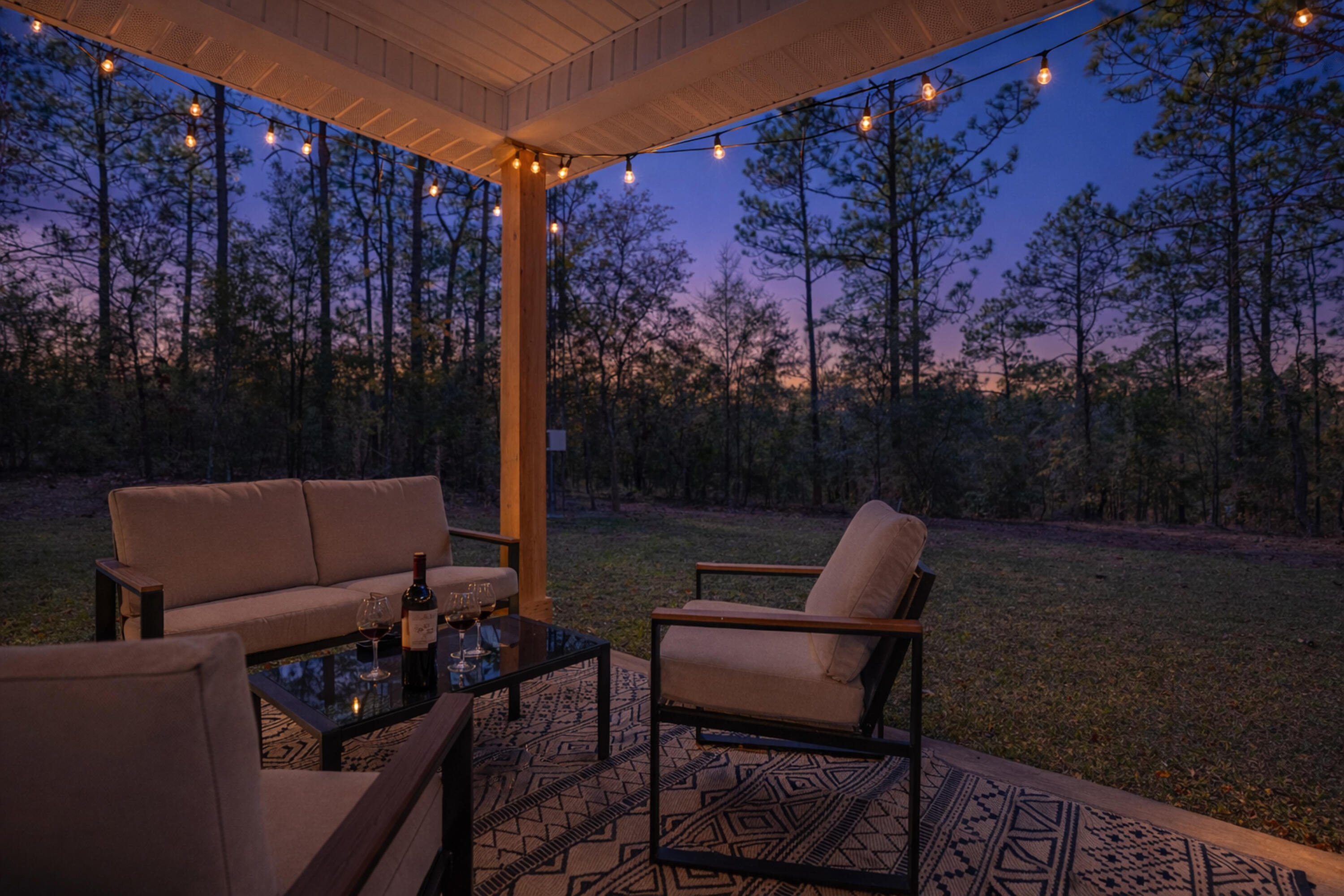 2021 Baldwin Street Chipley, FL 32428 - Photo 15 of 35 a backyard of a house with outdoor seating