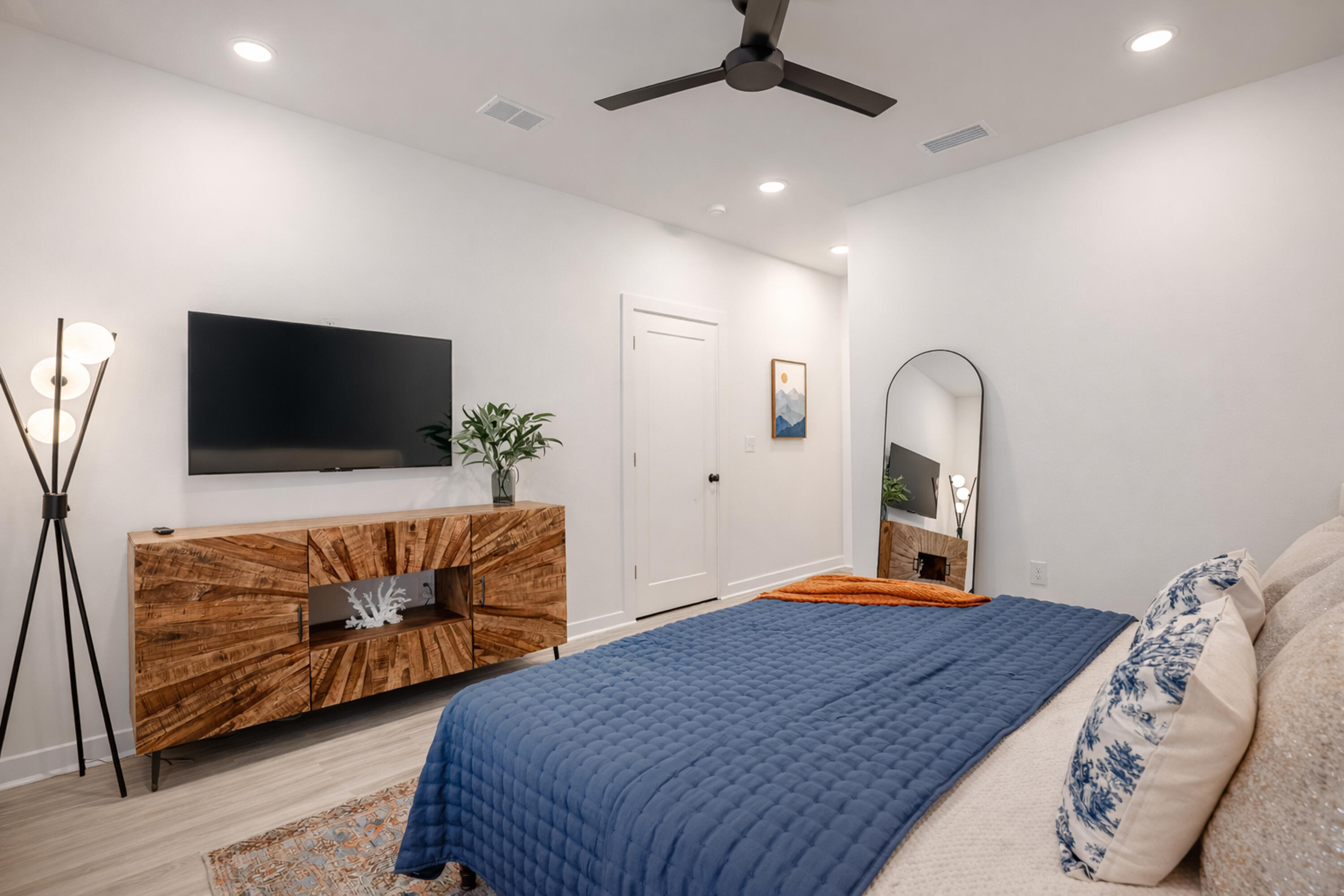 2021 Baldwin Street Chipley, FL 32428 - Photo 19 of 35 a bedroom with bed and a flat screen tv