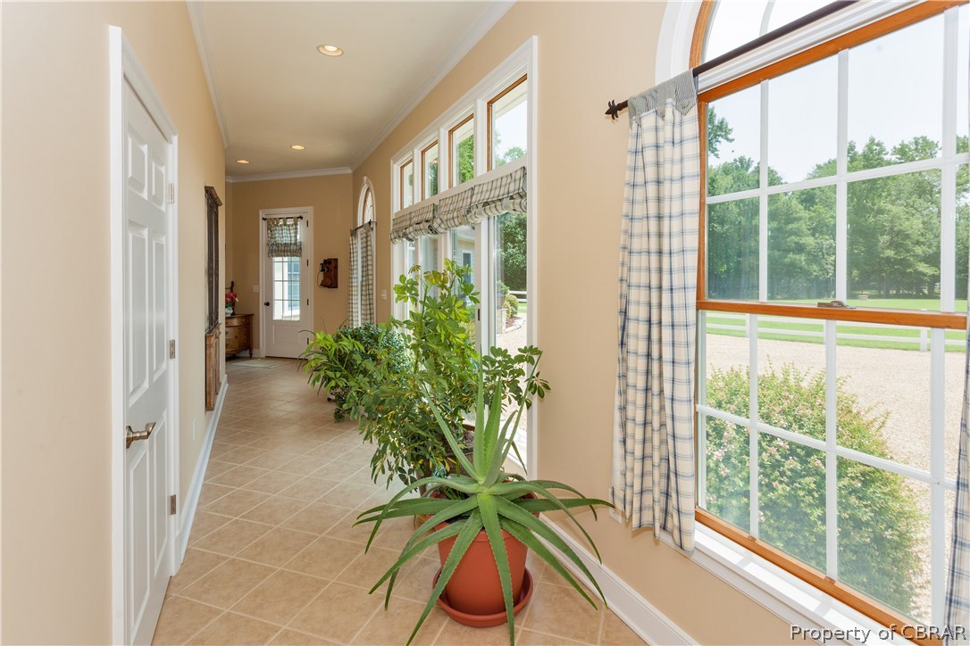 215 McSwain Road White Stone, VA 22578 - Photo 17 of 31 Back Entry Hallway - With floor to ceiling windows adding additional lighting this would make a beautiful conservatory for plants