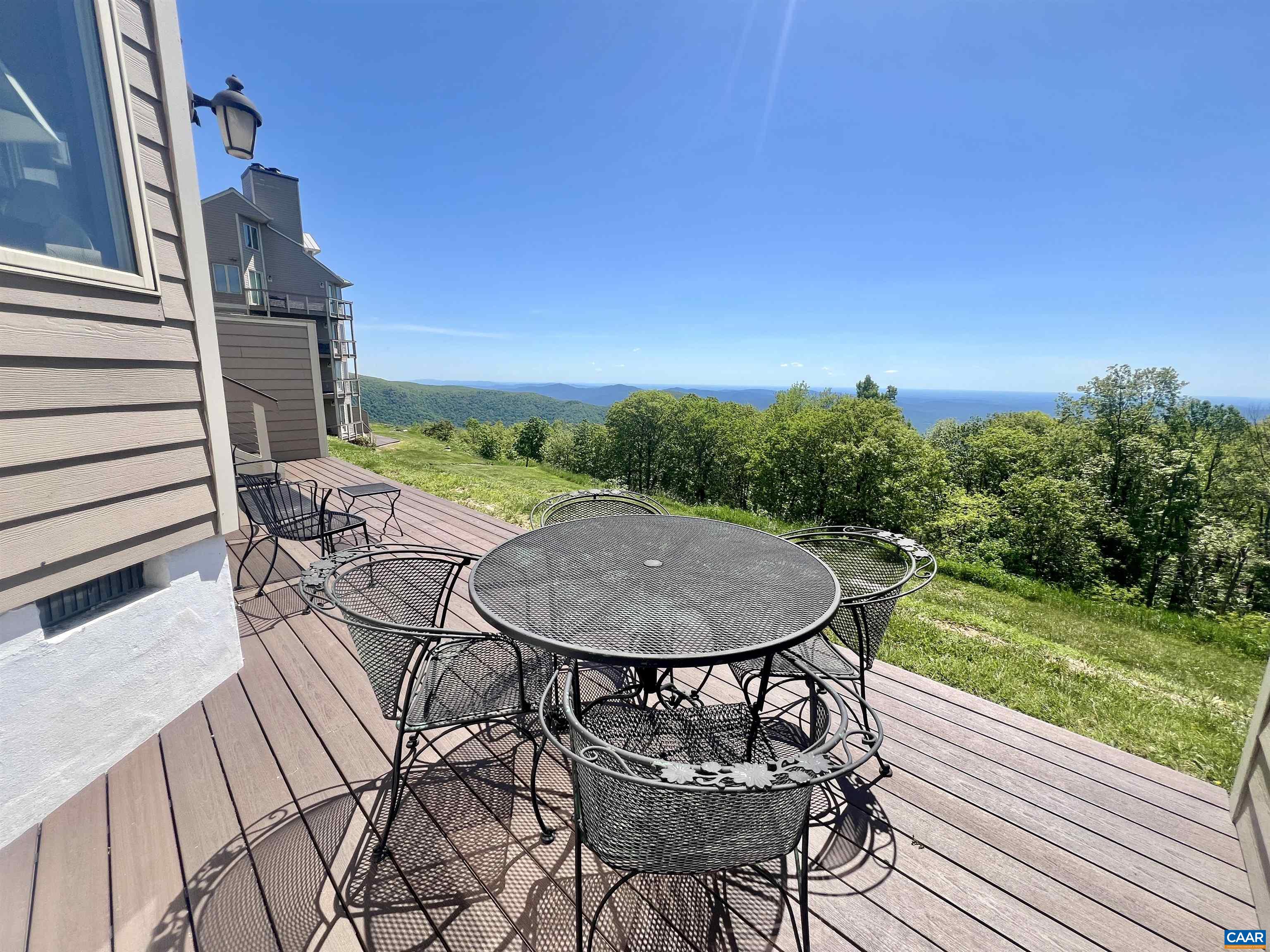 1808 High Ridge Roseland, VA 22967 - Photo 6 of 54 a view of a chairs and table in patio with wooden fence