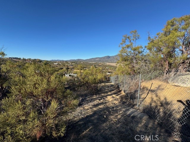54740 Cave Rock Road Anza, CA 92539 - Photo 36 of 47 a view of a city with mountains in the background