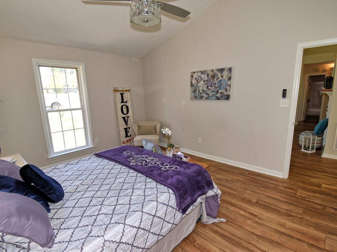 2201 Ruddy Road Raleigh, NC 27616 - Photo 14 of 27 a bedroom with a bed and a window