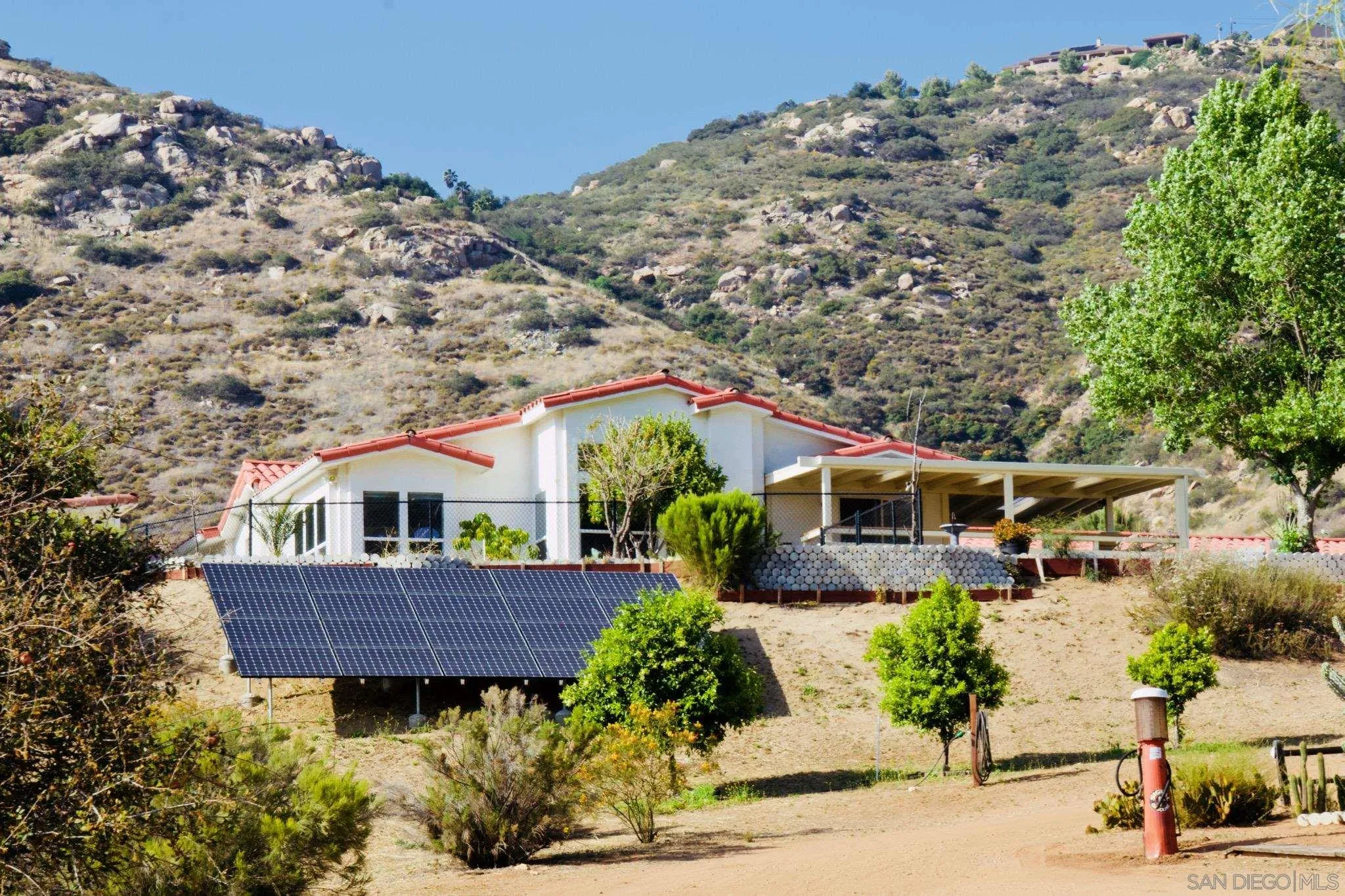 1285 Dehesa Ranch Road El Cajon, CA 92019 - Photo 5 of 61 an aerial view of house with yard and seating area
