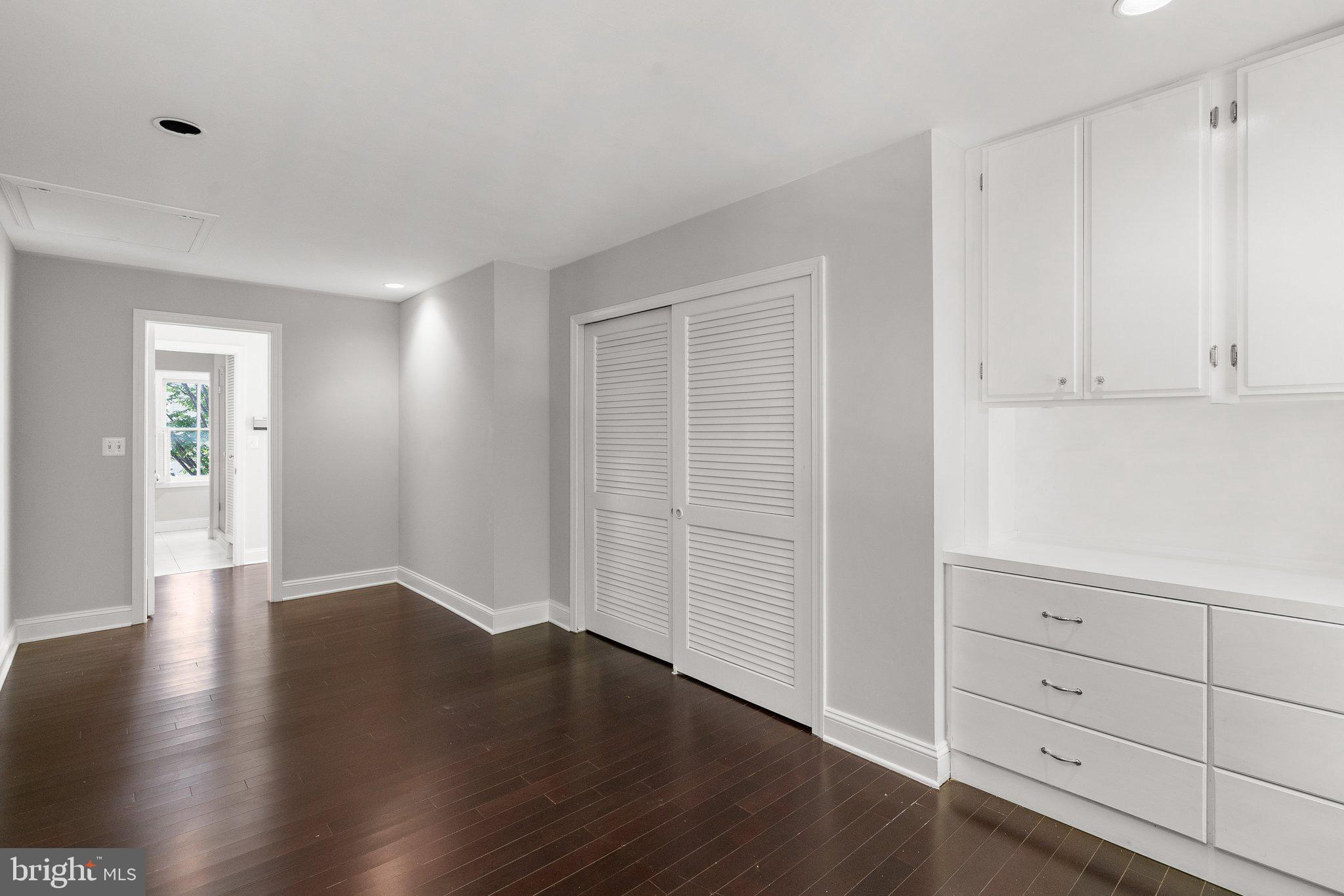 1257 35th Street Northwest Washington, DC 20007 - Photo 14 of 21 a view of an empty room with wooden floor