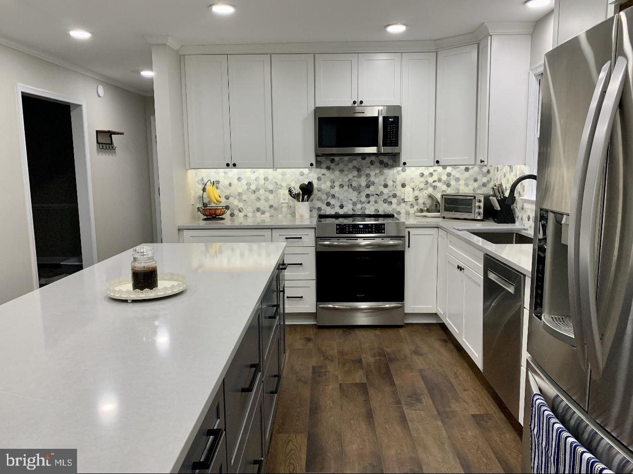 230 Richards Ferry Road Fredericksburg, VA 22406 - Photo 5 of 13 Modern kitchen with sleek finishes.