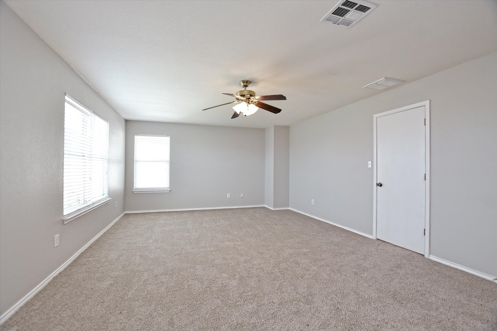 102 Blanco Woods Boulevard Elgin, TX 78621 - Photo 13 of 31 Primary Suite