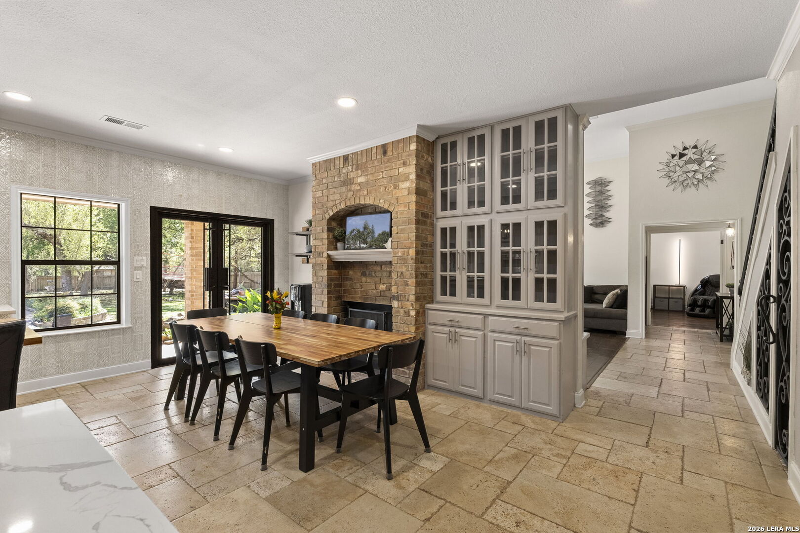 10918 Hunters Way Helotes, TX 78023 - Photo 18 of 49 a view of a dining room with furniture window and wooden floor