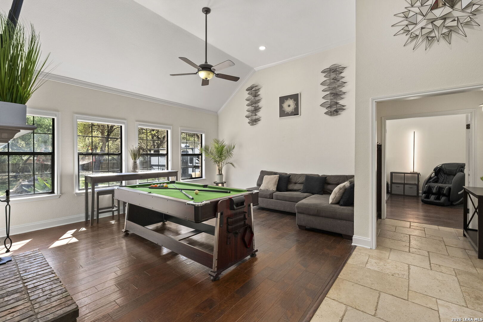 10918 Hunters Way Helotes, TX 78023 - Photo 19 of 49 a living room with furniture and a table