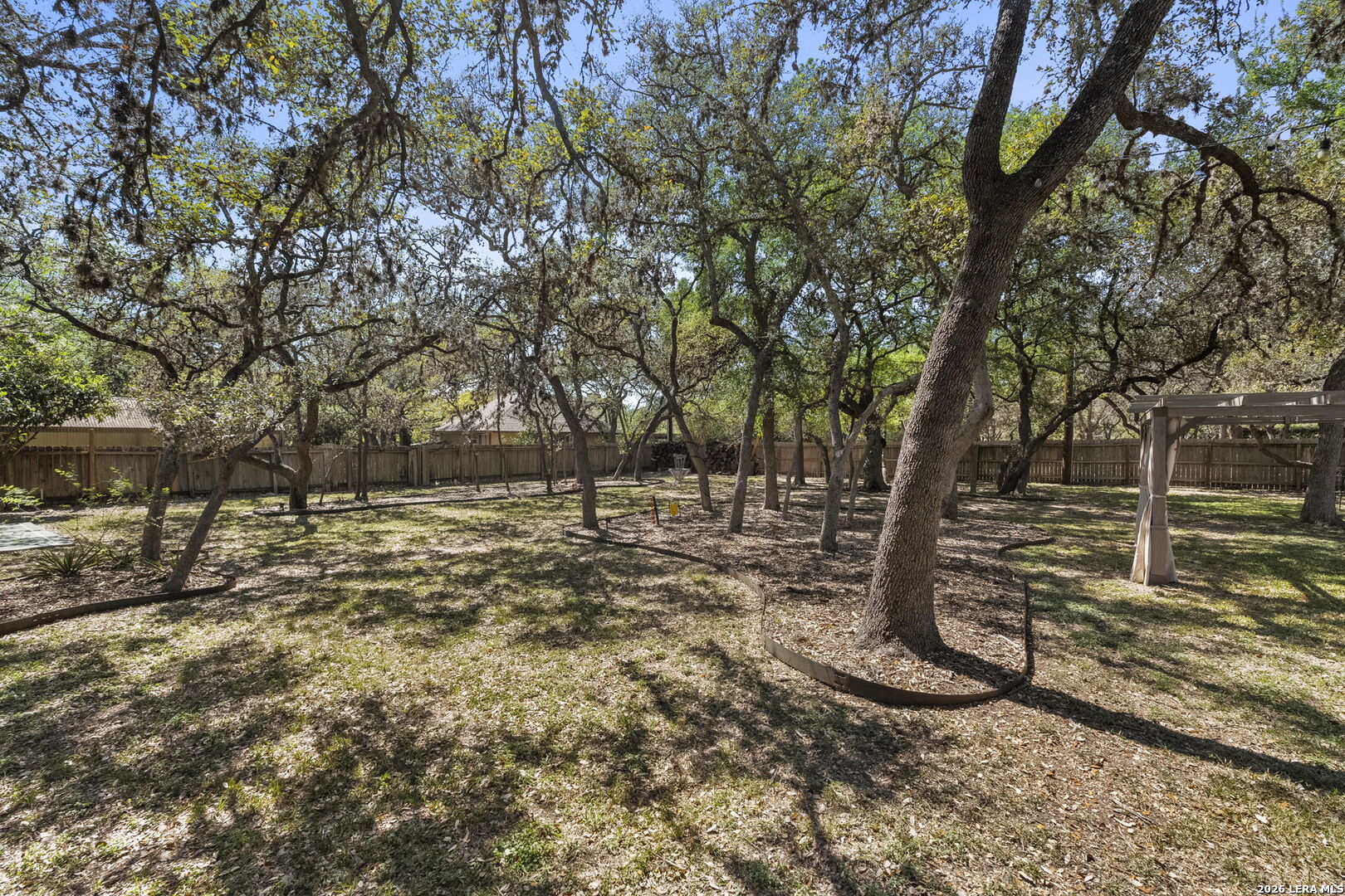 10918 Hunters Way Helotes, TX 78023 - Photo 39 of 49 a view of outdoor space with trees