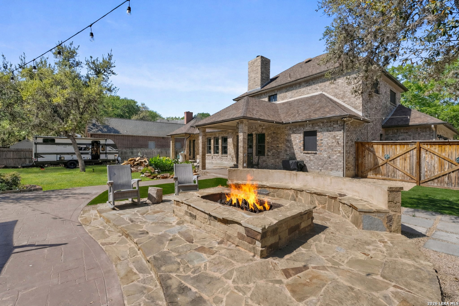 10918 Hunters Way Helotes, TX 78023 - Photo 44 of 49 a view of a house with backyard patio and swimming pool