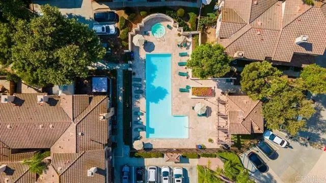 an aerial view of houses with outdoor space