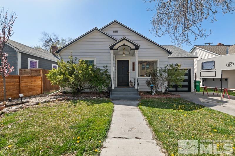 1451 Forest Street Reno, NV 89509 - Photo 1 of 23 a front view of a house with garden