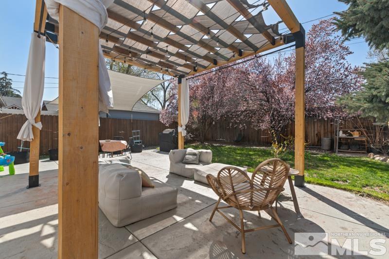 1451 Forest Street Reno, NV 89509 - Photo 20 of 23 a view of a patio with couches plants and city view