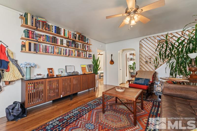 1451 Forest Street Reno, NV 89509 - Photo 3 of 23 a living room with furniture and a book shelf