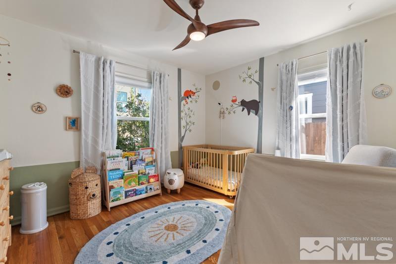 1451 Forest Street Reno, NV 89509 - Photo 10 of 23 a bedroom with furniture and a wooden floor