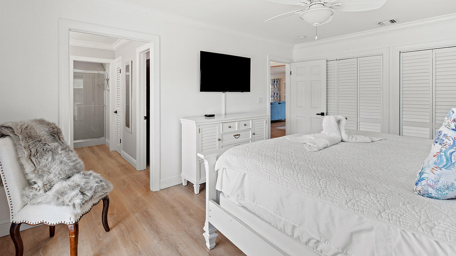 220 15th Circle Key Colony Beach, FL 33051 - Photo 18 of 43 a bedroom with a bed and a flat screen tv