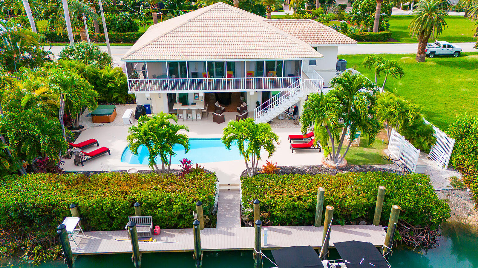 220 15th Circle Key Colony Beach, FL 33051 - Photo 2 of 43 a aerial view of a house and outdoor space