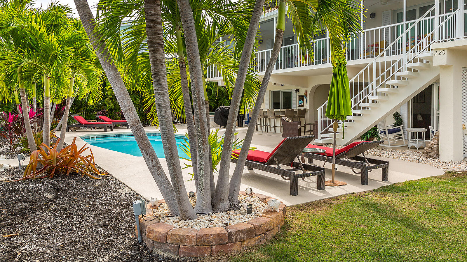 220 15th Circle Key Colony Beach, FL 33051 - Photo 22 of 43 a building outdoor space with seating space