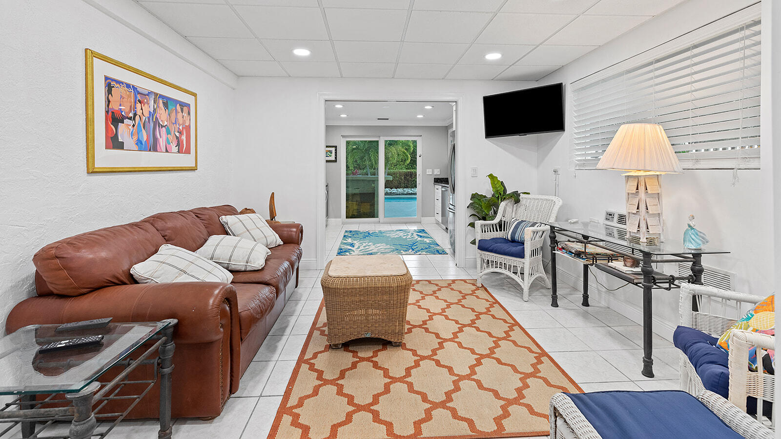 220 15th Circle Key Colony Beach, FL 33051 - Photo 30 of 43 a living room with furniture and a flat screen tv