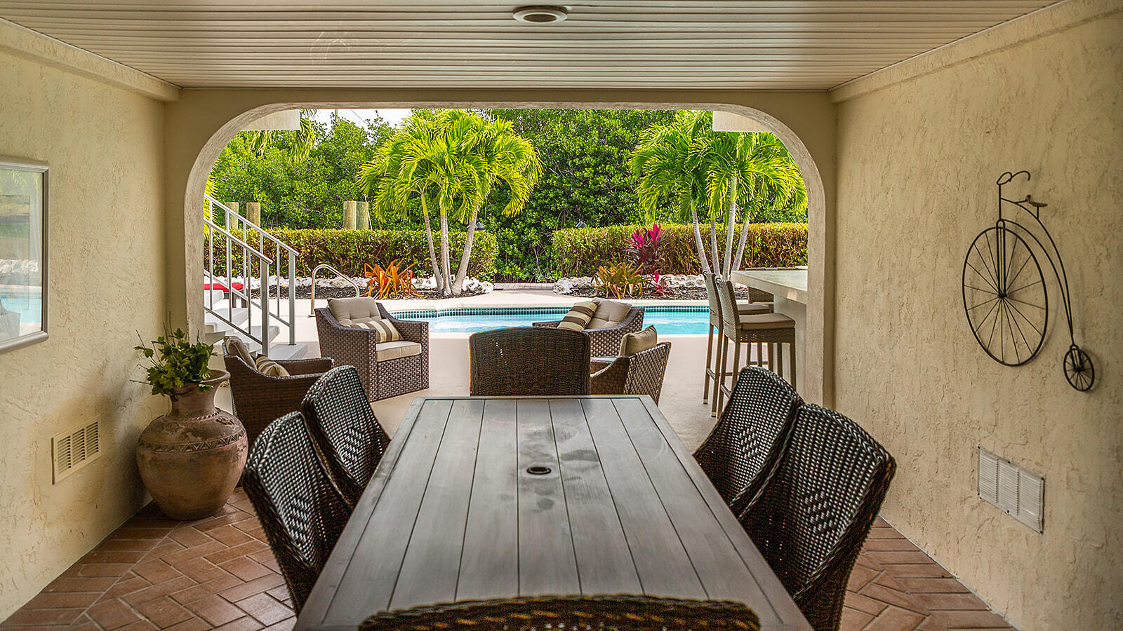 220 15th Circle Key Colony Beach, FL 33051 - Photo 37 of 43 a view of a dining room with furniture wooden floor and a rug