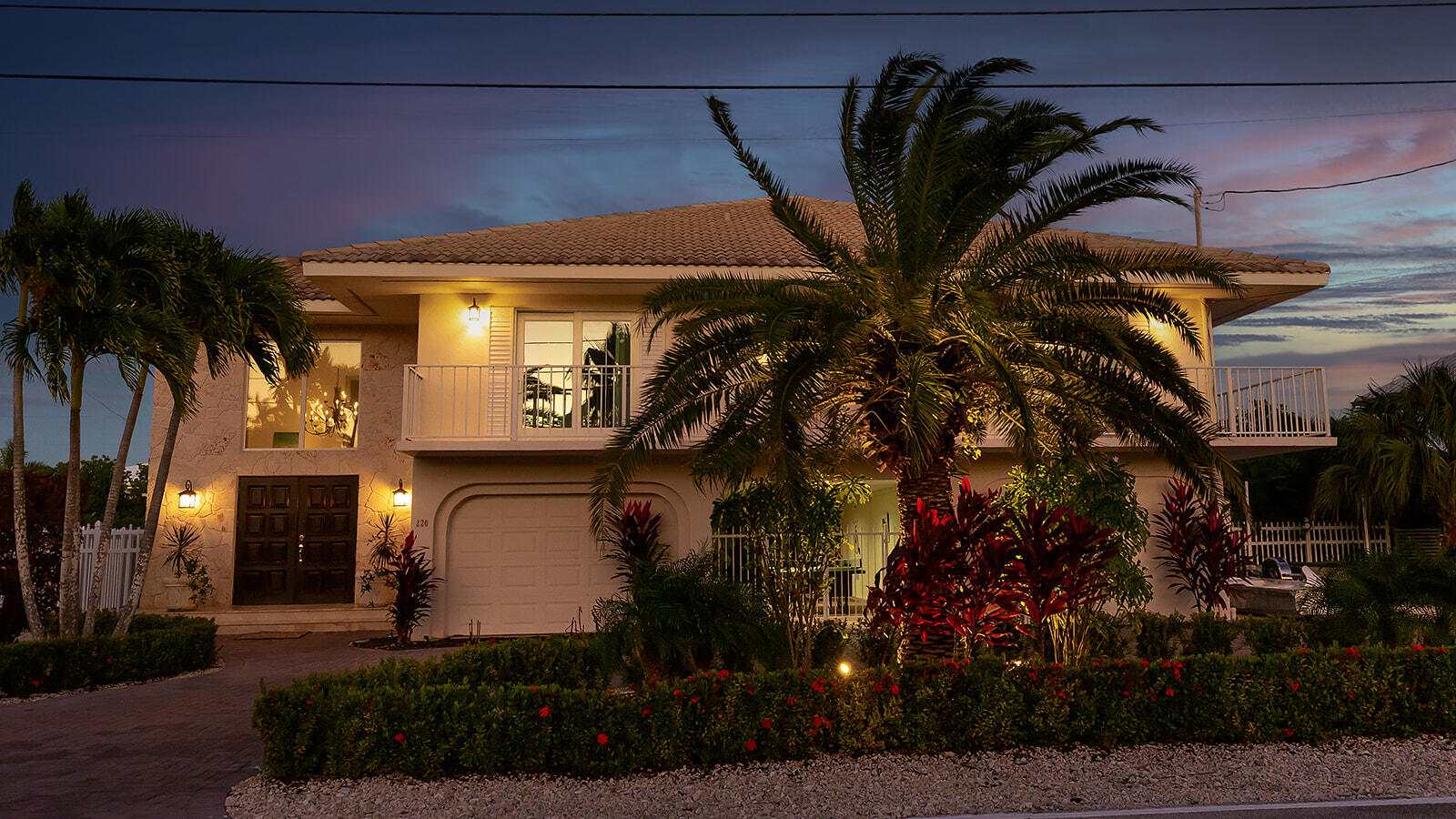 220 15th Circle Key Colony Beach, FL 33051 - Photo 41 of 43 a view of a house with plants and trees