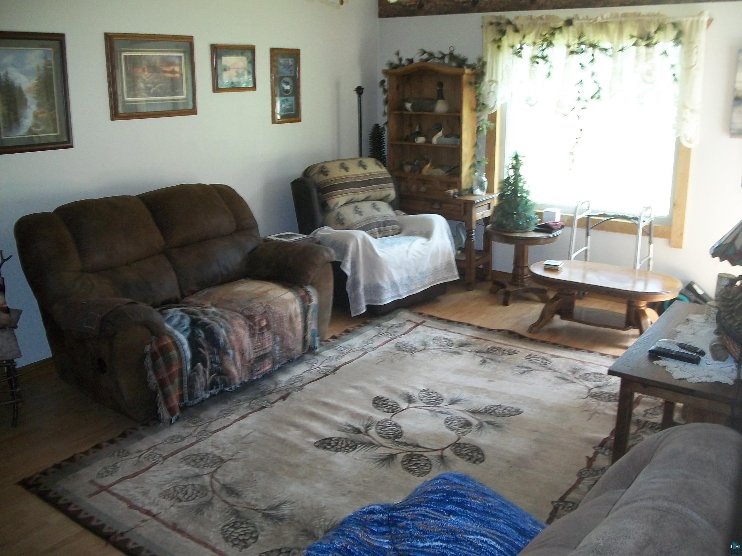 3917 Highway 5 Hibbing, MN 55746 - Photo 12 of 36 Living area with wood finished floors