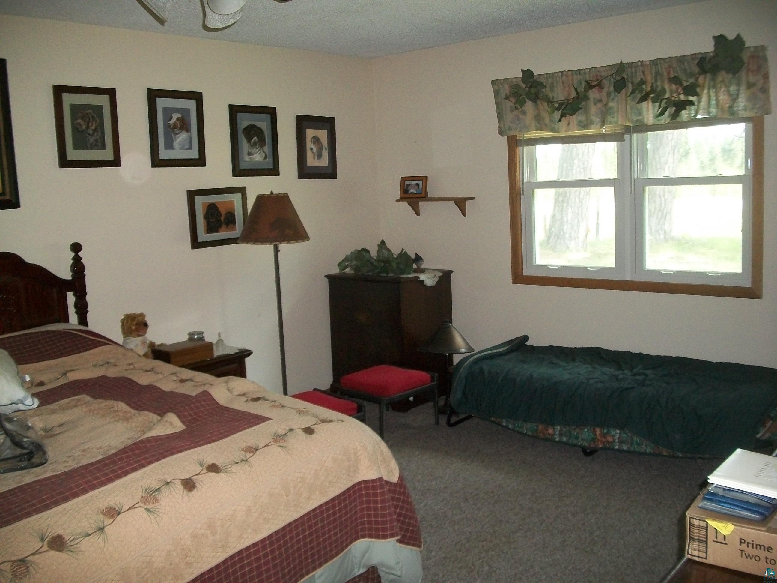 3917 Highway 5 Hibbing, MN 55746 - Photo 15 of 36 View of carpeted bedroom