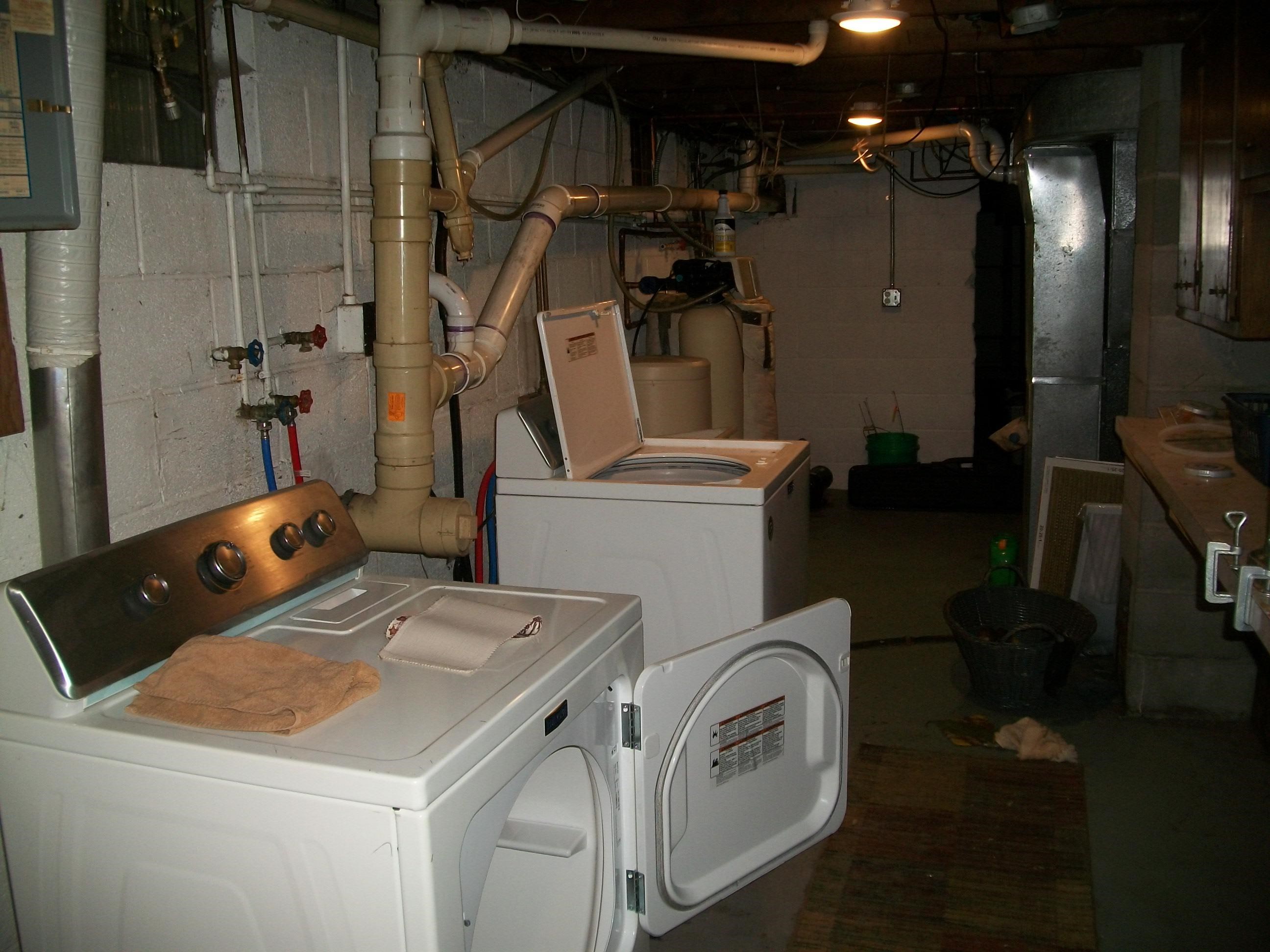 3917 Highway 5 Hibbing, MN 55746 - Photo 23 of 36 Clothes washing area featuring washing machine and dryer and laundry area