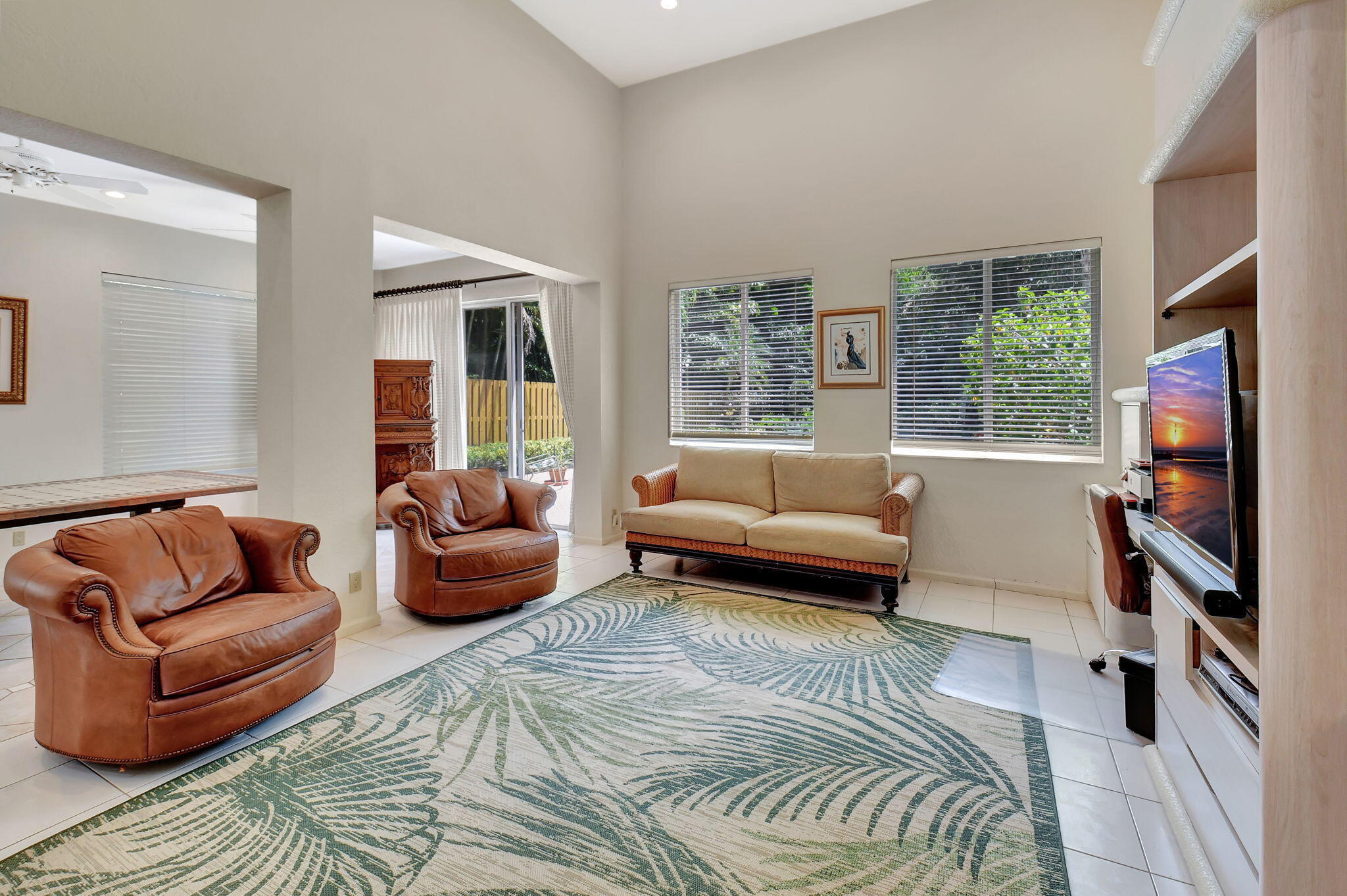 2462 Northwest 66th Drive Boca Raton, FL 33496 - Photo 14 of 49 a living room with furniture and a couch