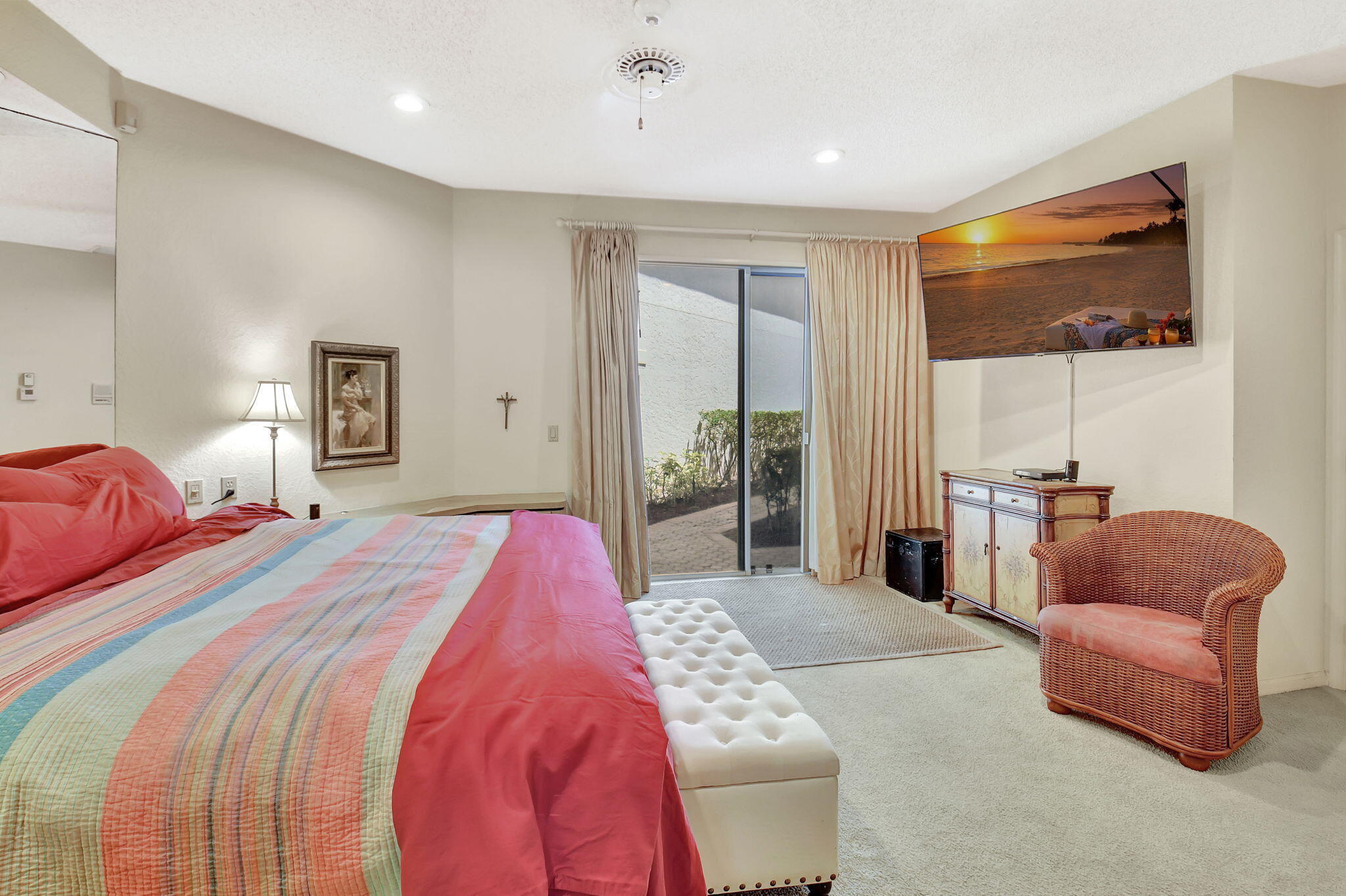 2462 Northwest 66th Drive Boca Raton, FL 33496 - Photo 23 of 49 a spacious bedroom with a large bed and a couch