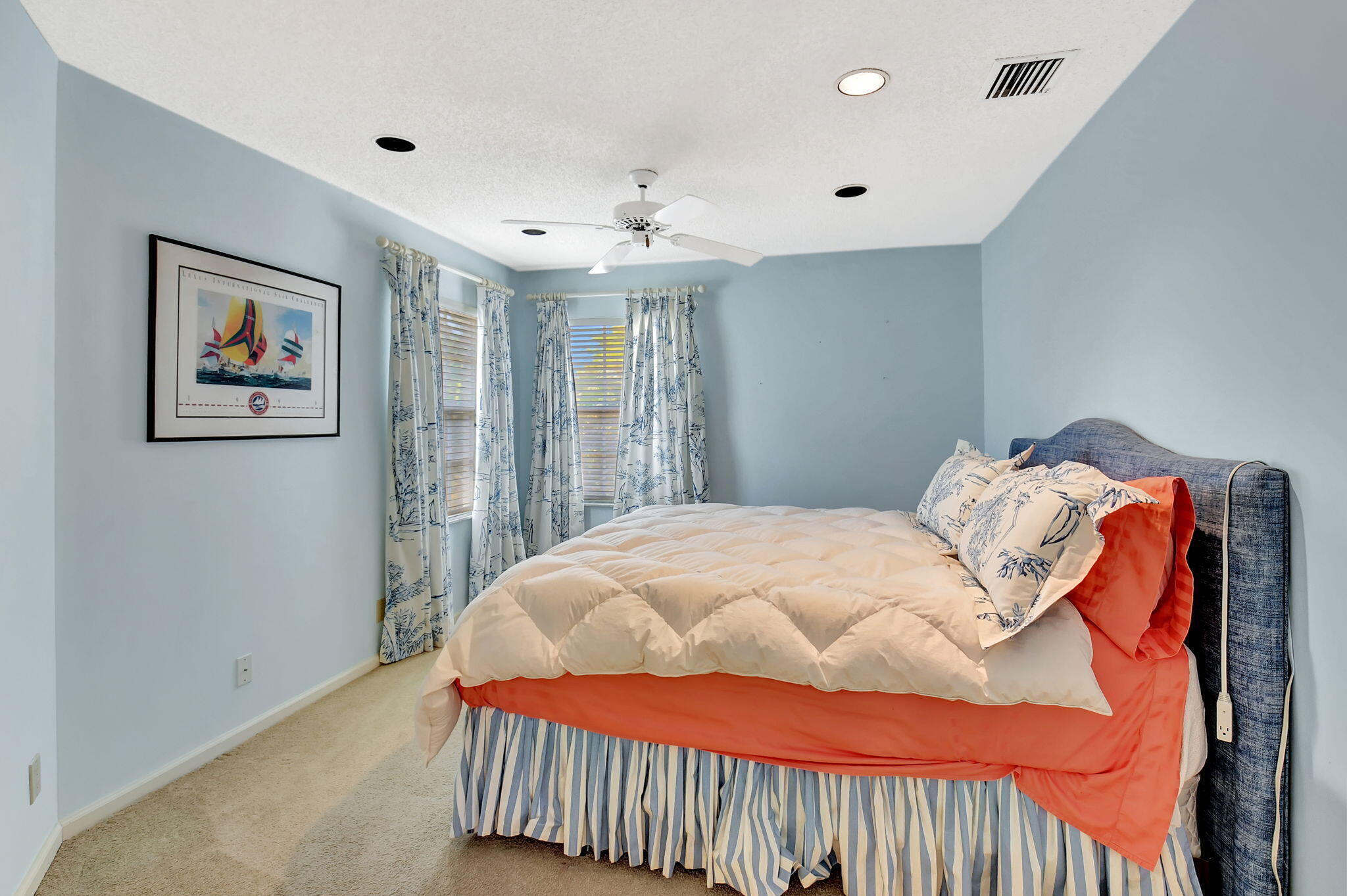 2462 Northwest 66th Drive Boca Raton, FL 33496 - Photo 28 of 49 a bedroom with a bed and a painting on the wall