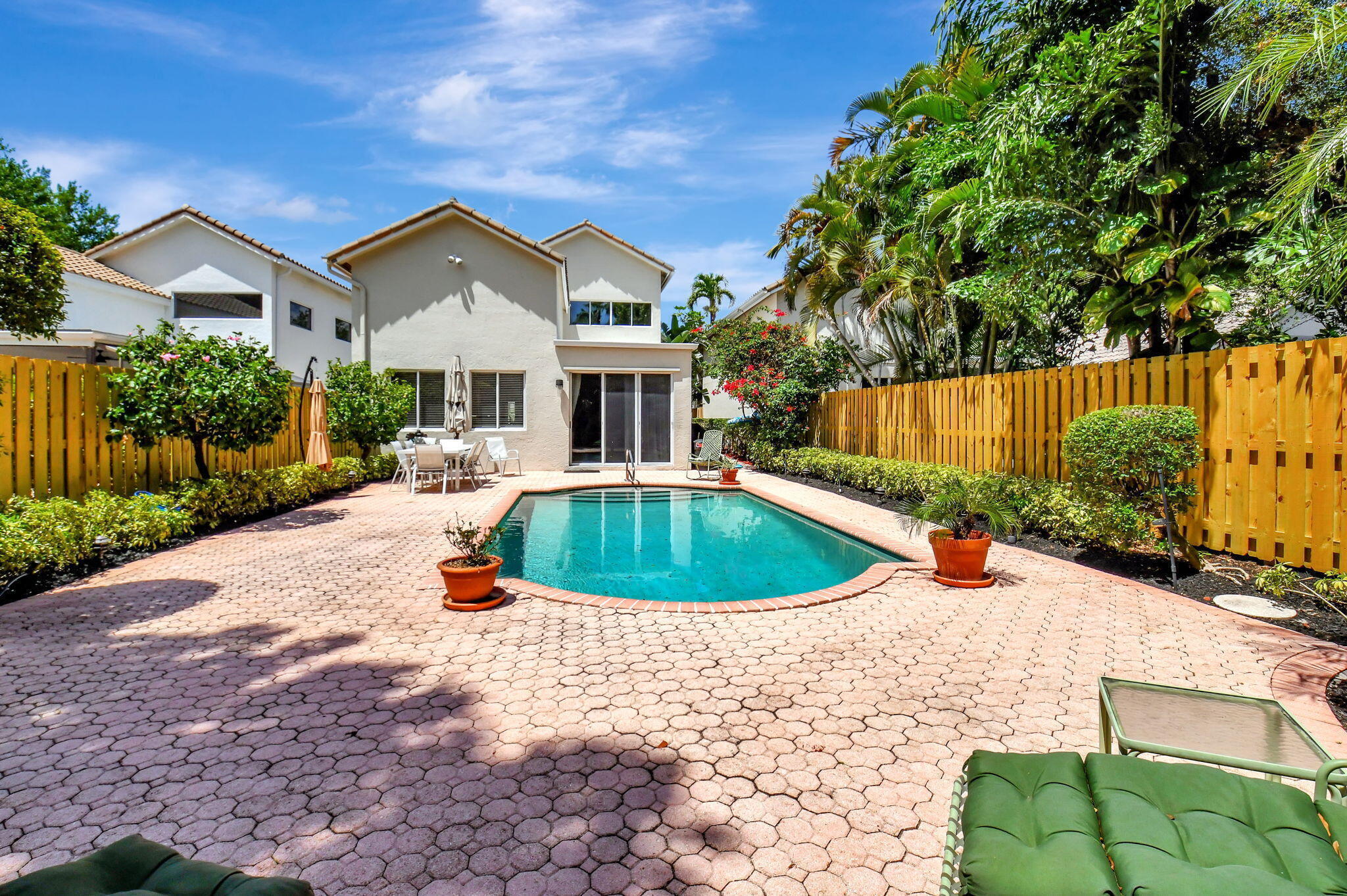 2462 Northwest 66th Drive Boca Raton, FL 33496 - Photo 37 of 49 a view of outdoor space yard and swimming pool