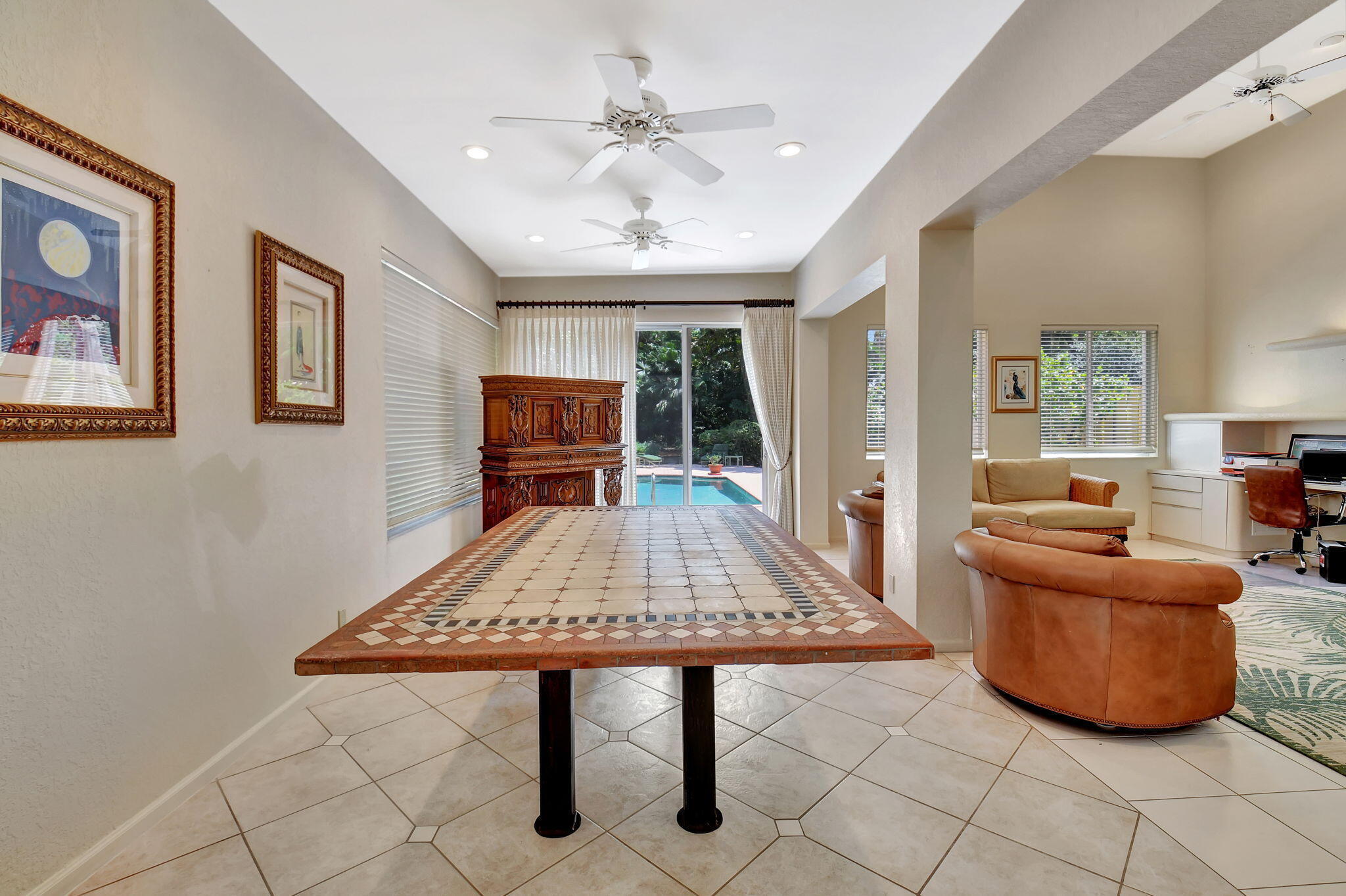 2462 Northwest 66th Drive Boca Raton, FL 33496 - Photo 10 of 49 a living room with furniture and a table