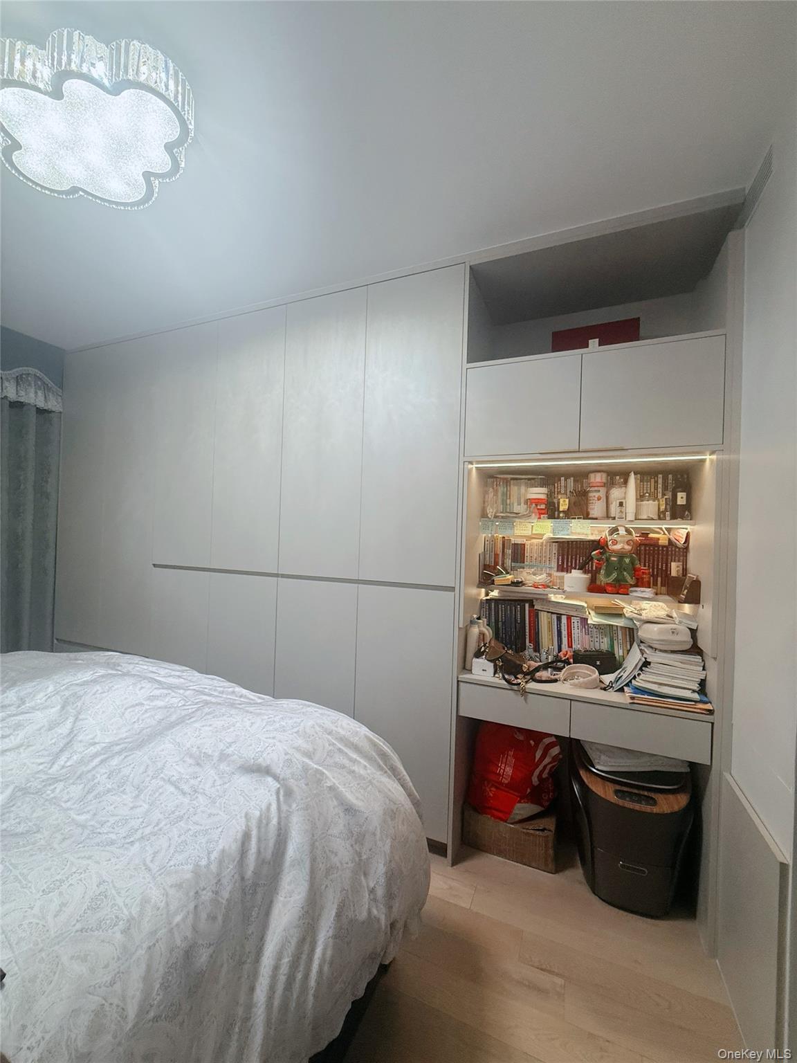 131-02 40th Road, Unit 4U Queens, NY 11354 - Photo 5 of 10 Bedroom with light wood finished floors