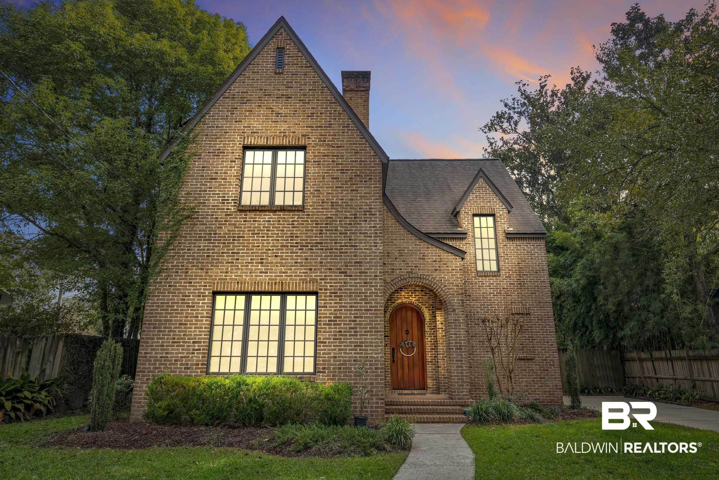 7 Bienville Avenue Mobile, AL 36606 - Photo 2 of 32 English style home with brick siding and a chimney