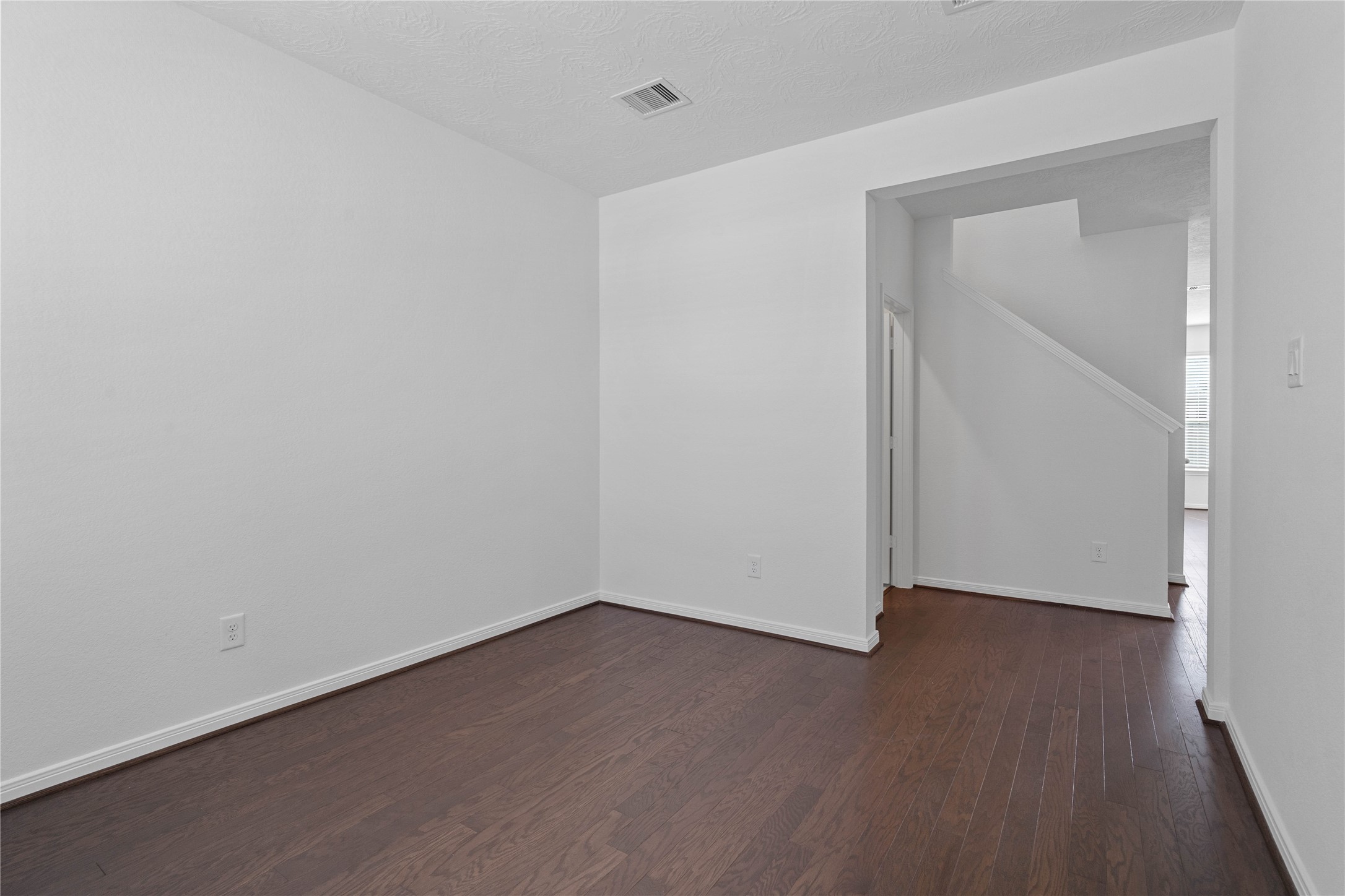 25503 Alpine Switchback Drive Spring, TX 77373 - Photo 6 of 32 Additional view from Den into hallway. On the left is the powder room and stair ahead is the Great Room beyond the staircase.