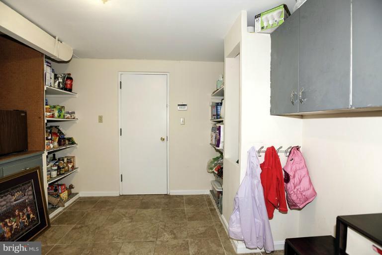 5905 Rolston Road Bethesda, MD 20817 - Photo 22 of 27 a view of a room with closet and window